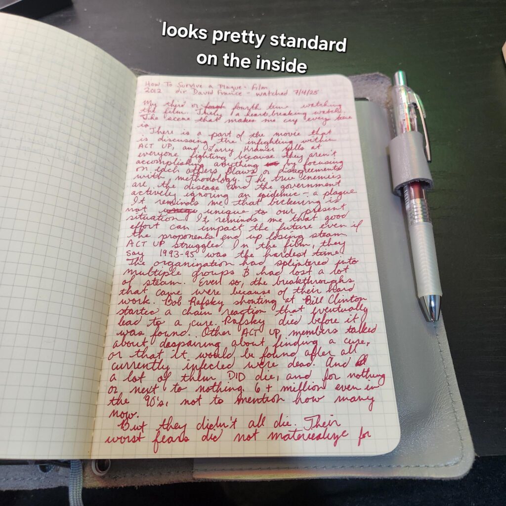 Page of handwritten red text discussing my opinion on How To Survive a Plague. I'm unfortunately not copying all that. Text "Looks pretty standard inside"